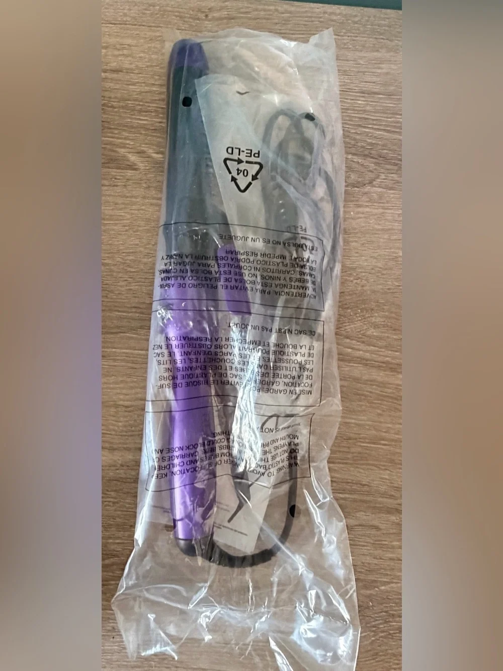 Revlon Purple Curling Iron with Black Barrel